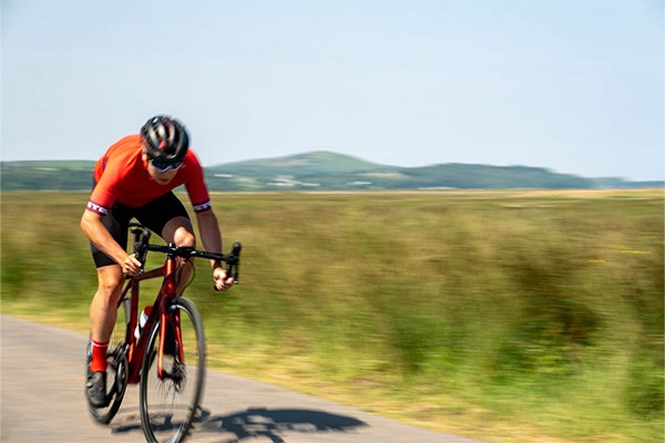 Road rider sprinting on an orro in castelli